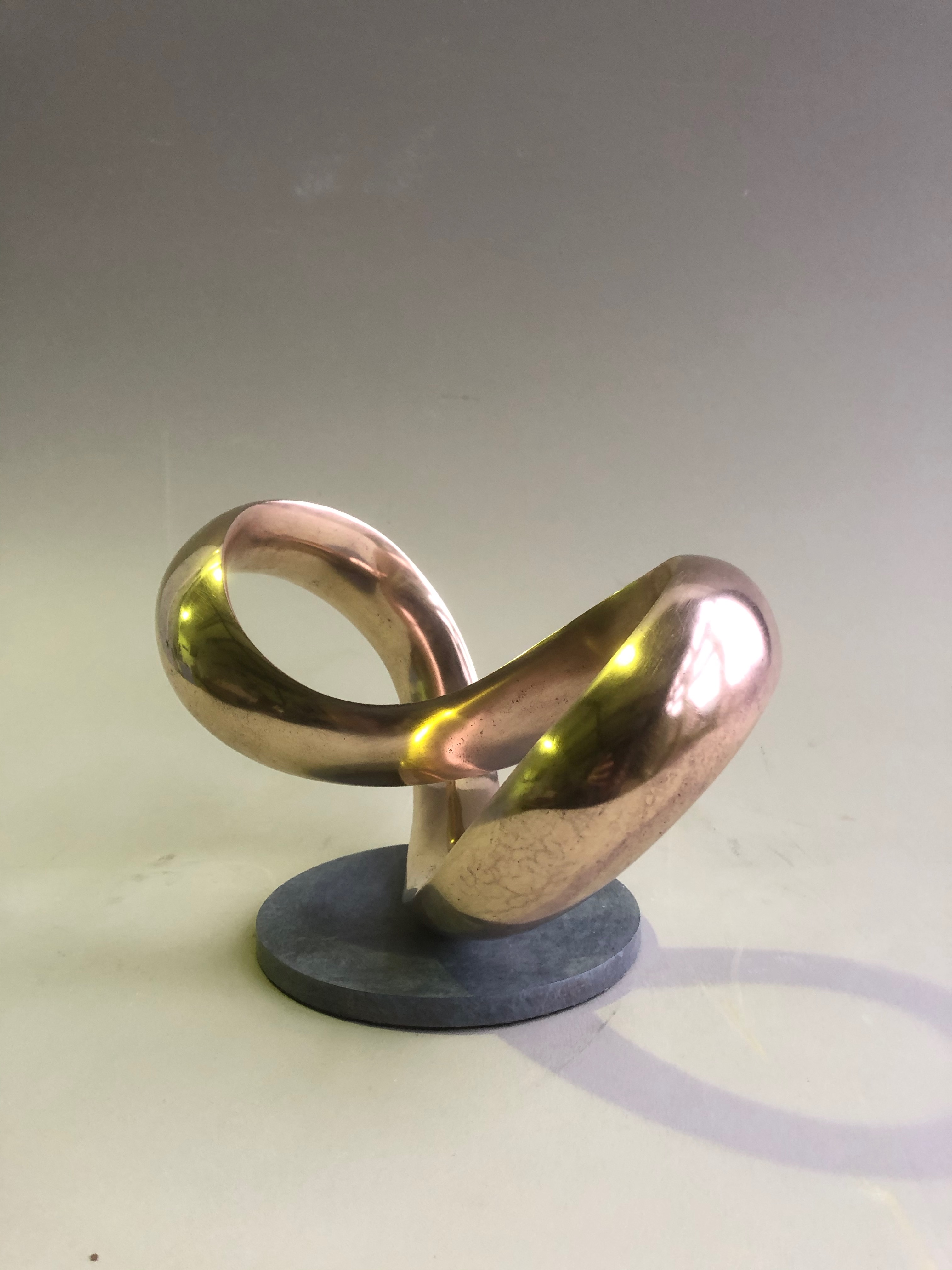 Moebius In Bronze VI. With polished finish rather than patination. 23 cm high ( not incl base ) x 27 cm